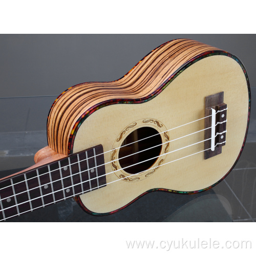 Premium green pearl rimmed ukulele